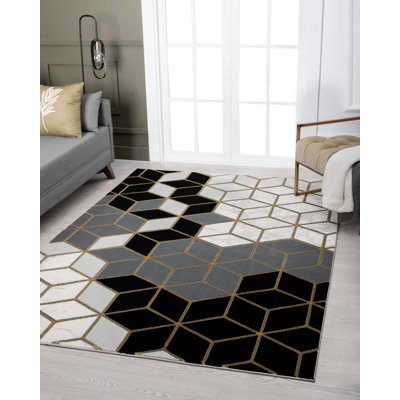 Tapis noir à motifs géométriques