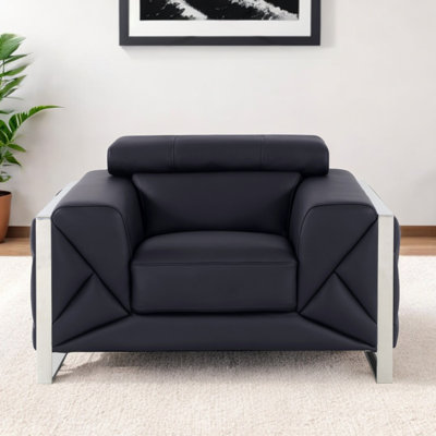 Fauteuil club noir en cuir italien avec détails argentés