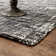 Tapis gris en laine touffeté à la main