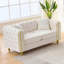 Causeuse Chesterfield en velours moelleux