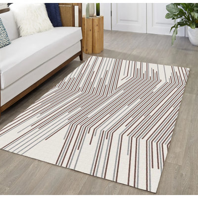 Tapis beige beige à rayures géométriques crème et beige
