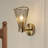 Single Gold Metal Wall Sconce, Wireframe Shade, Versatile Modern-luxe Lighting