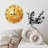 Golden Clock Face With Glowing Sphere