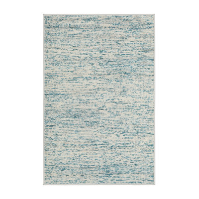 Tapis contemporain vert mer