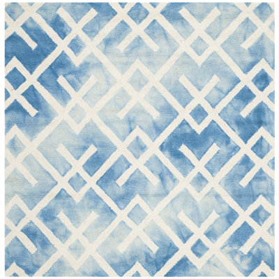 Bryauna Hand Tufted Wool/Cotton Geometric Rug in Blue/Ivory