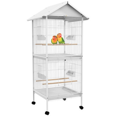 Cage à oiseaux blanche 67 po sur plateforme roulante. Intérieur spacieux pour. Grandes portes avant, portes coulissantes pour aliments. 4 perchoirs en bois, contenants en plastique. Nettoyage facile avec plateau coulissant. Déplacement facile