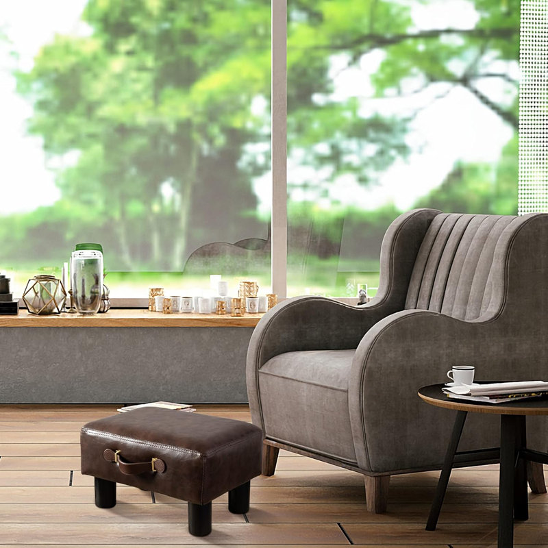 Tabouret de pieds brun en similicuir
