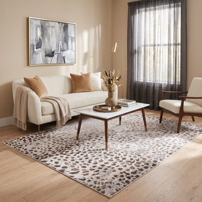 Tapis beige et doré à imprimé animal de la collection Nevada