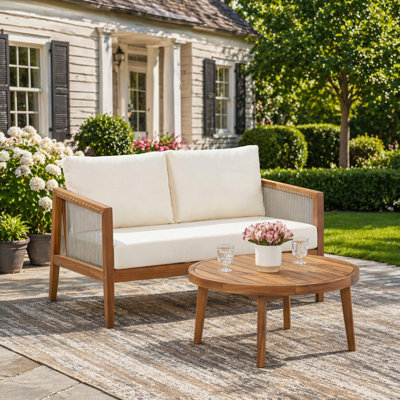 Ensemble de causeuse et de table basse d'extérieur, structure en bois d'acacia avec détails en corde, coussins beiges hydrofuges pour patio / cour arrière / terrasse, finition teck