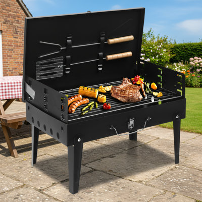 This Black, Square, Portable, Folding Charcoal Grill Is Made Of Cast Iron, Making It Resistant To Paint Chipping. It Saves Space And Comes With A Lid, Making It Practical And Convenient For Outdoor Grilling.
