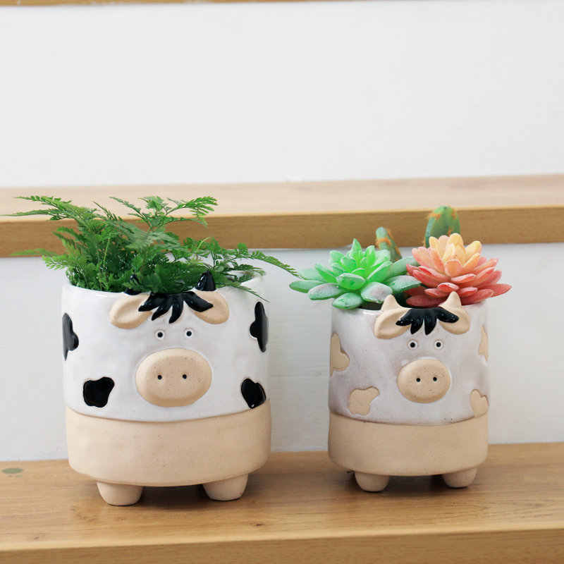 Owens Ceramic Statue Planter