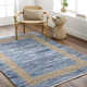 Demie Abstract Handmade Flatweave Recycled P.E.T. Area Rug in Blue/Tan