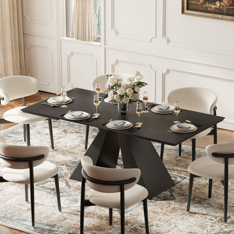 63"–94.5" Modern Extendable Dining Table with Black Sintered Stone Top and Carbon Steel Pedestal Base