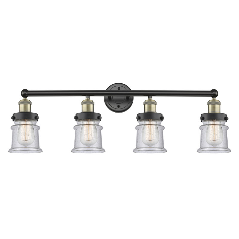 Petit luminaire pour salle de bain 4 lumières Cailen de la collection Edison, Granuleux, Laiton antique noir