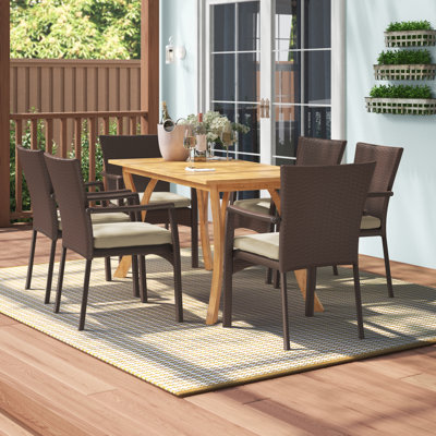 Hodges 6 - Person Acacia Wicker Patio Dining Set with Rectangular Table