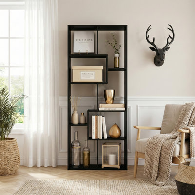Bibliothèque moderne à géométrie asymétrique avec tablettes décalées, placement horizontal ou vertical