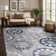Chartier Machine Woven Floral Area Rug