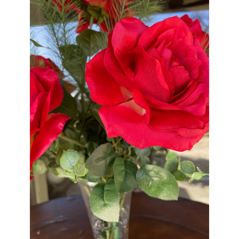 Arrangement de roses Siete dans un vase