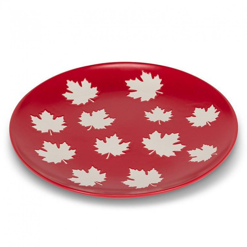 Maple Leaves On Red Plate