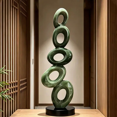 Sculpture moderne en résine abstraite verte empilée
