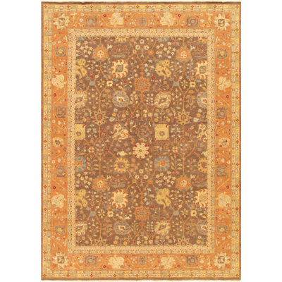 Tapis orange / brun en laine noué à la main