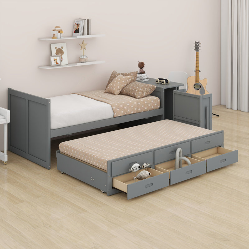 Lit plateforme avec bureau et tablette de rangement au bout du lit, lit gigogne et tiroirs, gris