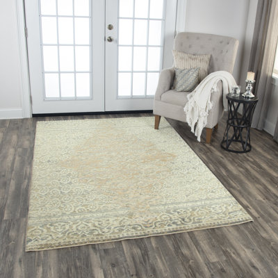 Tapis beige en laine tissée au métier électrique Alfredson