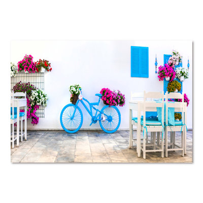 Vieux vélo bleu avec fleurs - photographie sur toile