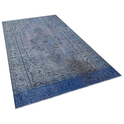 Tapis oriental bleu turc en laine noué à la main