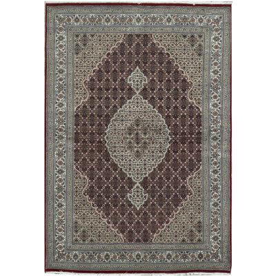 Tapis rouge et ivoire noué à la main de haute qualité