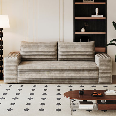 Canapé en velours côtelé avec assise profonde et coussin moelleux
