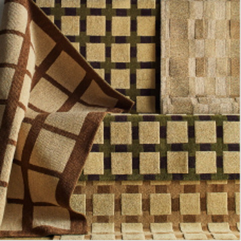 Textured area rugs featuring a grid of raised geometric squares in olive green, brown, and beige tones.