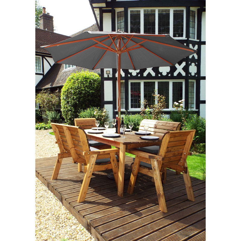 Faulk 6 - Person Wood Patio Dining Set with Rectangular Table , Cushions Included, Grey