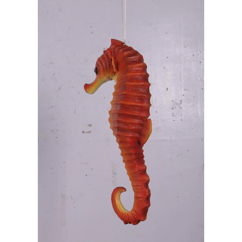 Petite statue d'hippocampe rouge