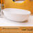 65" L X 29.5 " W Solid Surface Freestanding Soaking Bathtub With Overflow And Pop-Up Drain