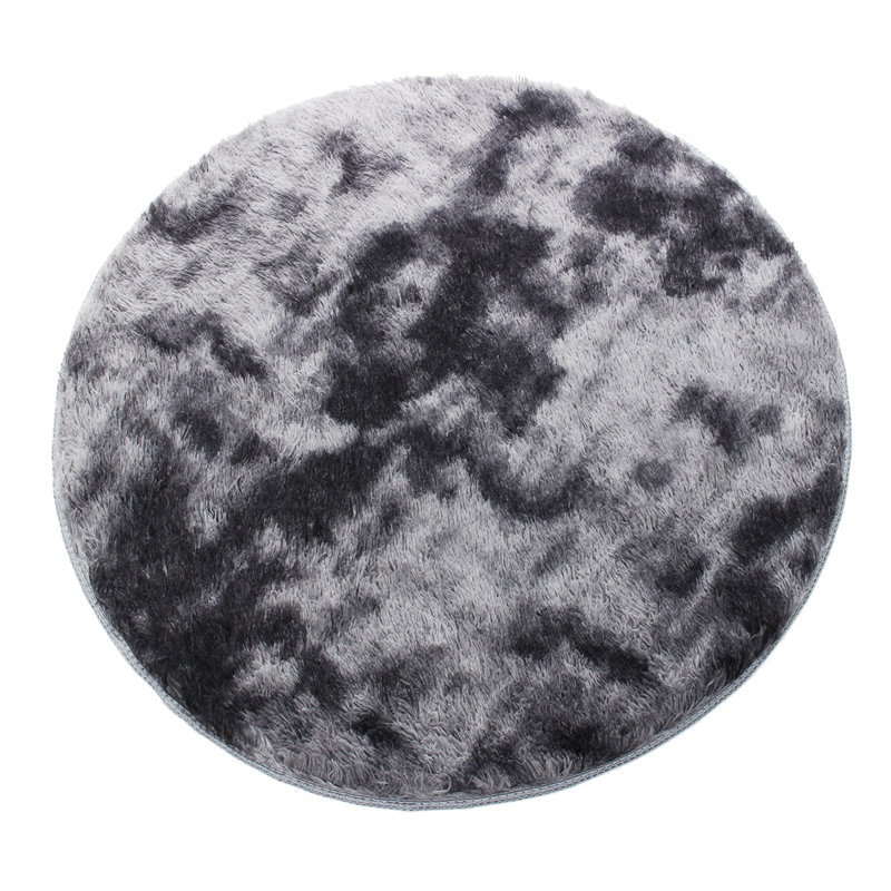 Tapis rond gris foncé fait à la main