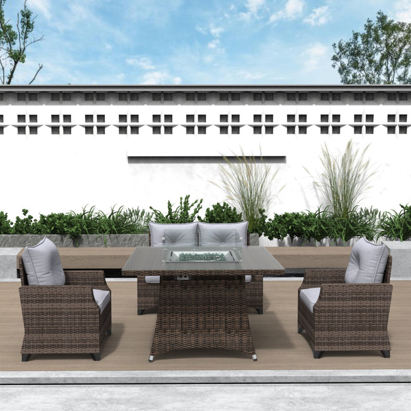 Schwerin Wicker 4 - Person Patio Conversation Set with Cushions