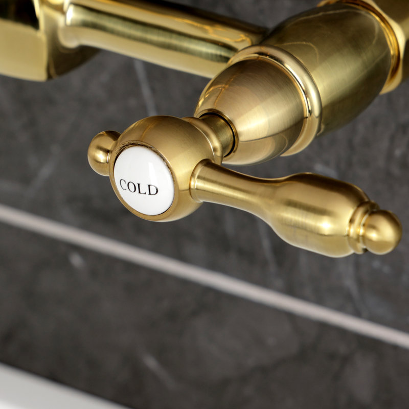 Kingston Brass Tudor Double-Handle 2-Hole Wall-Mount Bridge Kitchen Faucet, Brushed Brass