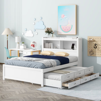 Lit plateforme double avec lit gigogne, tiroirs et prises USB, combinant rangement et commodité pour les chambres à coucher modernes