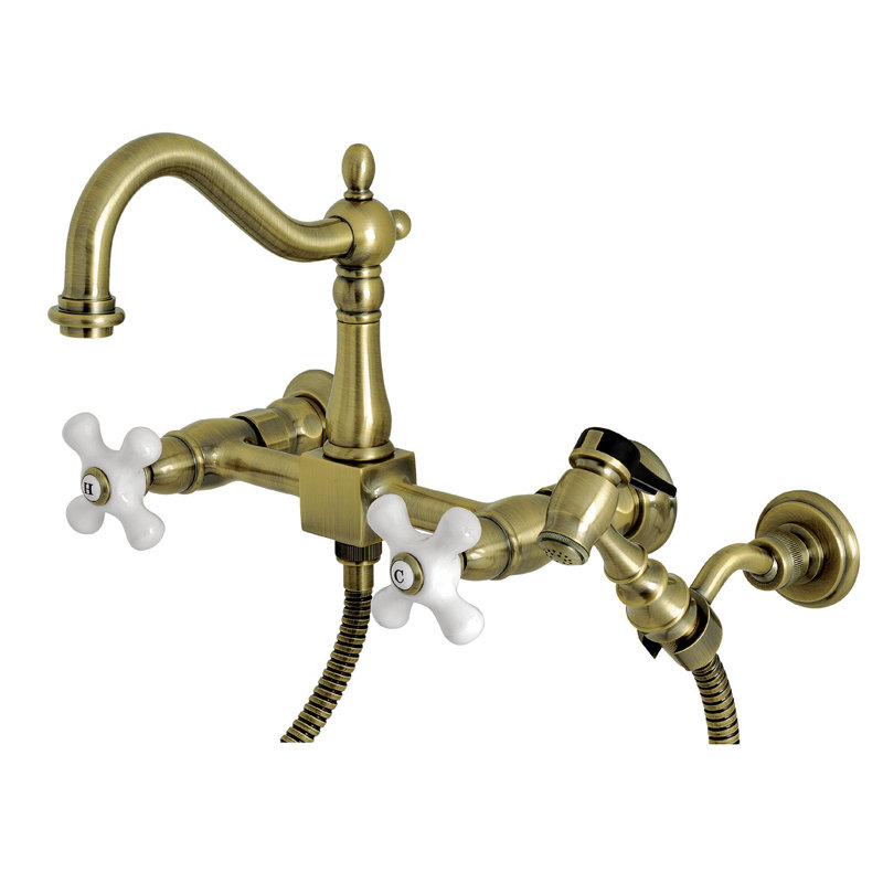 Kingston Brass Heritage Double-Handle 3-Hole Wall-Mount Bridge Kitchen Faucet with Brass Sprayer, Antique Brass