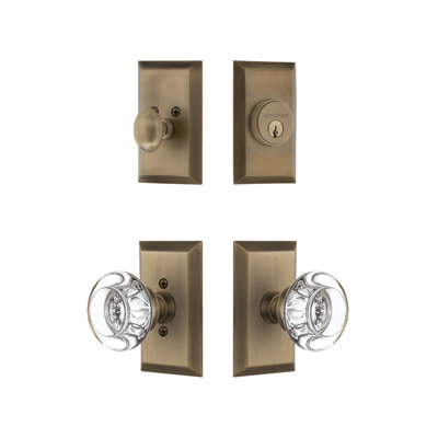 Ensemble d'entrée Nostalgic Warehouse Studio avec bouton rond en cristal transparent en laiton antique