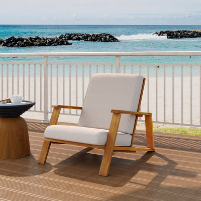 Chaise longue d'extérieur de style club avec coussin beige et structure en bois d'acacia teck