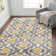 Tapis gris / jaune / crème à motif géométrique Caritta