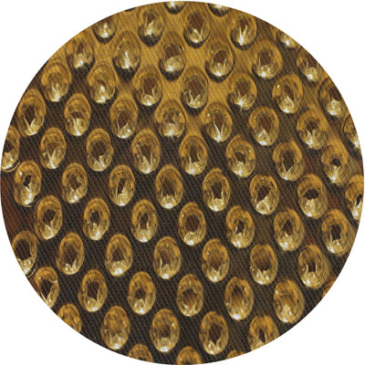 Tapis doré/jaune tissé à la machine