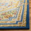 Priscila Handmade Tufted Wool Blue/Ivory Area Rug-550799382