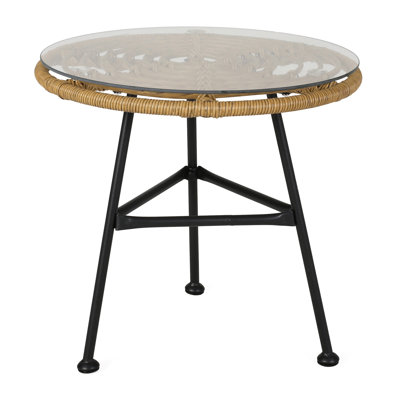 Table contemporaine avec plateau en verre translucide et design épuré