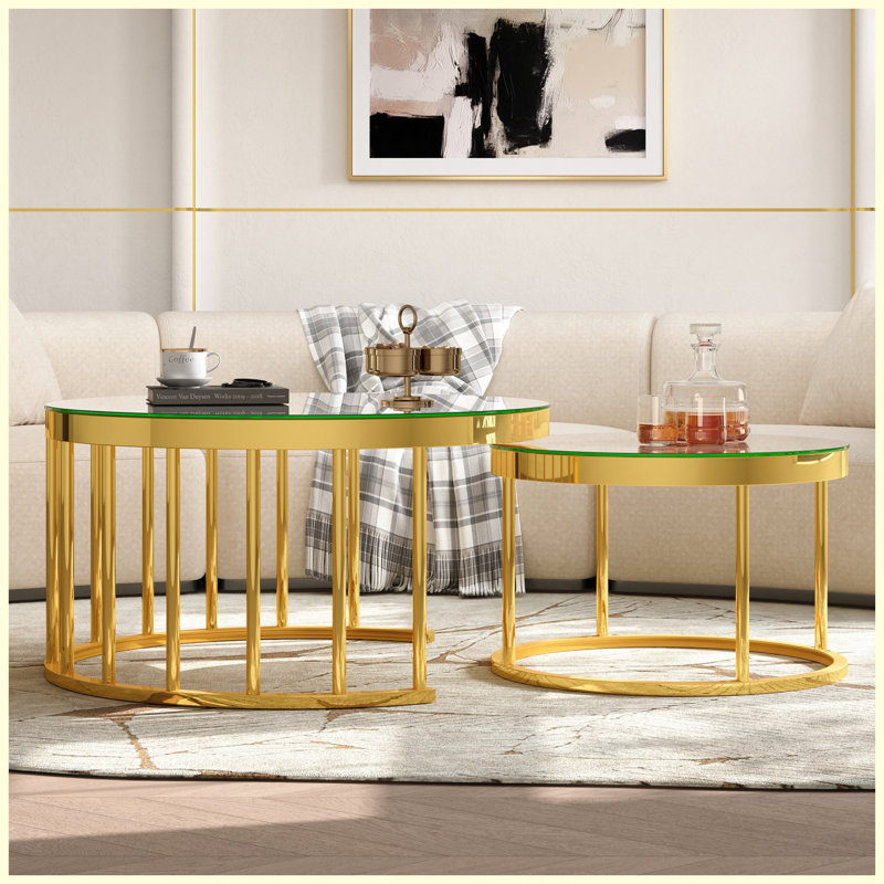 Ensemble de 2 tables basses rondes gigognes à structure circulaire en métal doré avec plateau à finition miroir pour salon et appartement