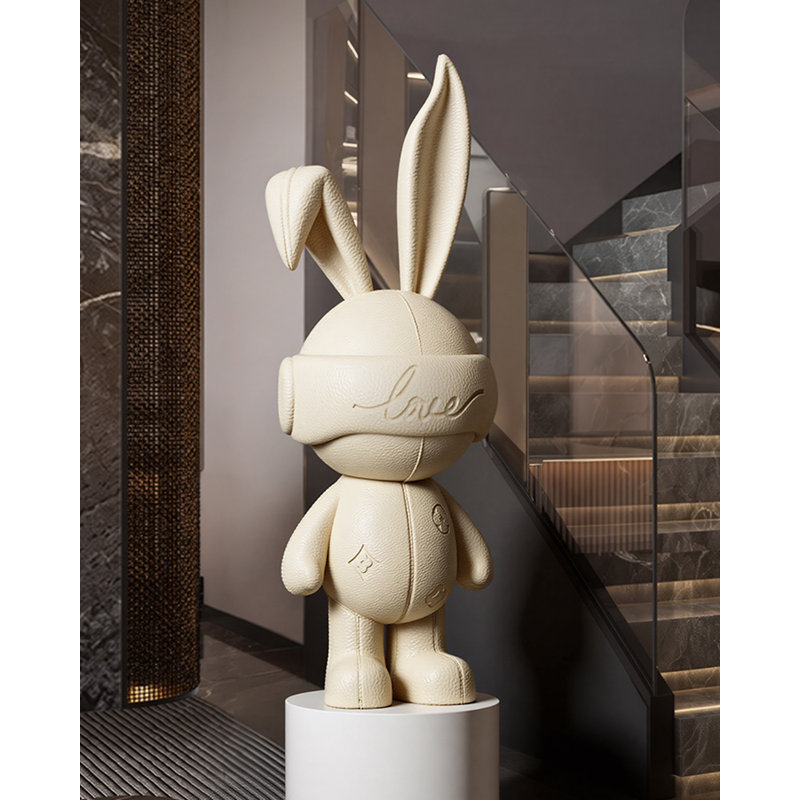 Lapin pelucheux en résine, Beige
