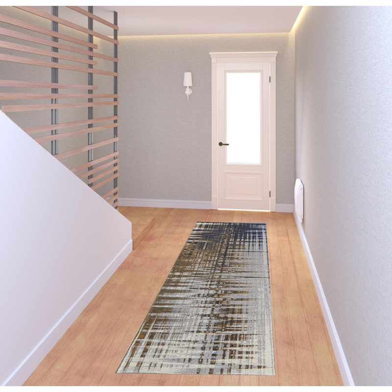 Tapis bleu, orange et gris
