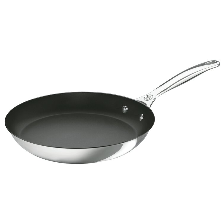 https://assets.wfcdn.com/im/28744684/resize-h755-w755%5Ecompr-r85/1233/12330057/Le+Creuset+Stainless+Steel+Fry+Pan.jpg